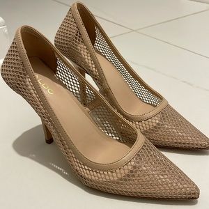 Beautiful shoes. Go with everything. Gorgeous heel.